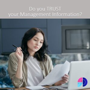 Do you trust your management information. A lady looking at a report with a sceptical look on her face